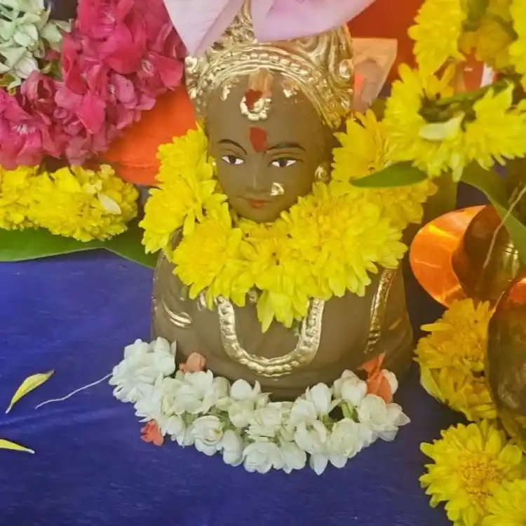 Order traditional Ganpati Pooja backdrop with flowers and drapes